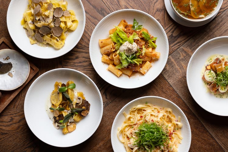 A selection of pasta dishes on a table