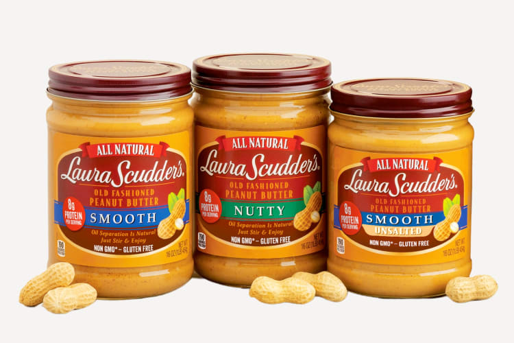 Three jars of Laura Scudder's all natural peanut butter