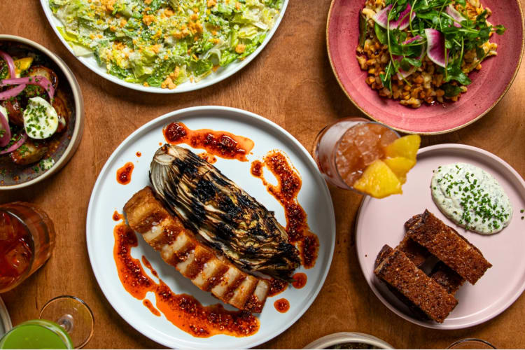 Colorful plates with various dishes on a table