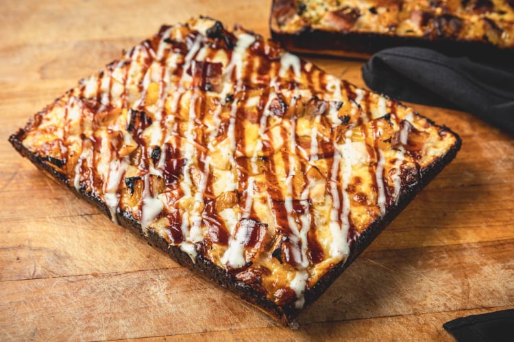 A square pizza on a table