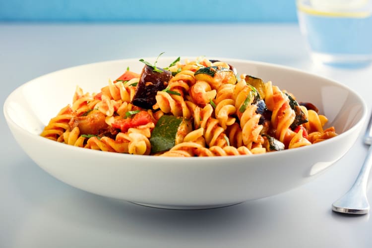 A bowl of roasted vegetable pasta