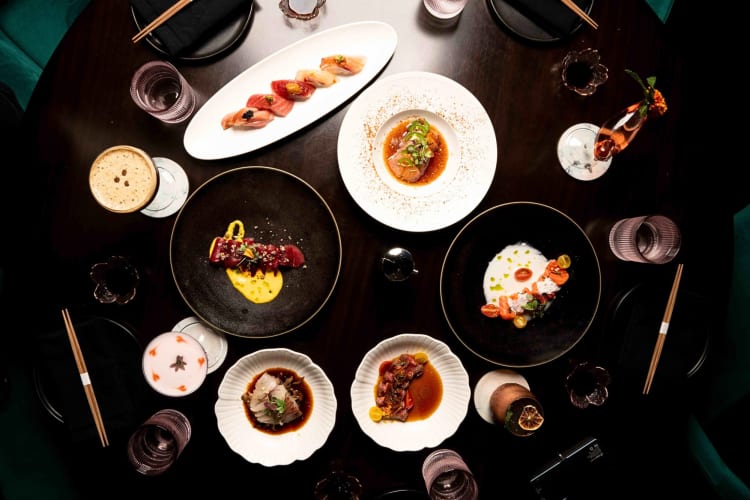 Aerial view of a variety of meals and drinks from Norikase