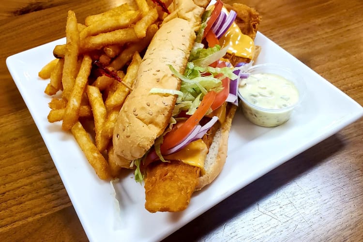 Meat-based roll meal with fries from Olympic Diner in Columbus