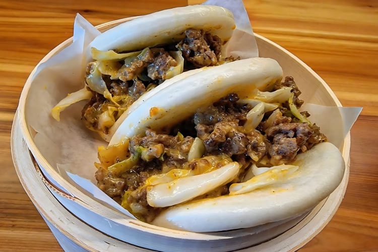 Bao bun with beef, cabbage and american cheese