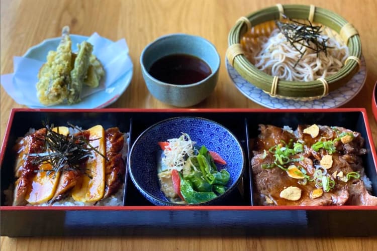 Bento box served with veggies