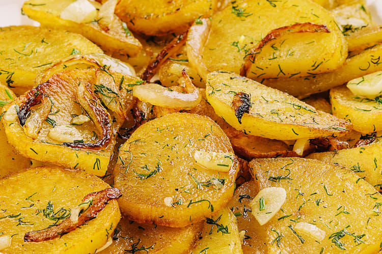 Patatas a lo pobre is a classic Granada food tourists have to try