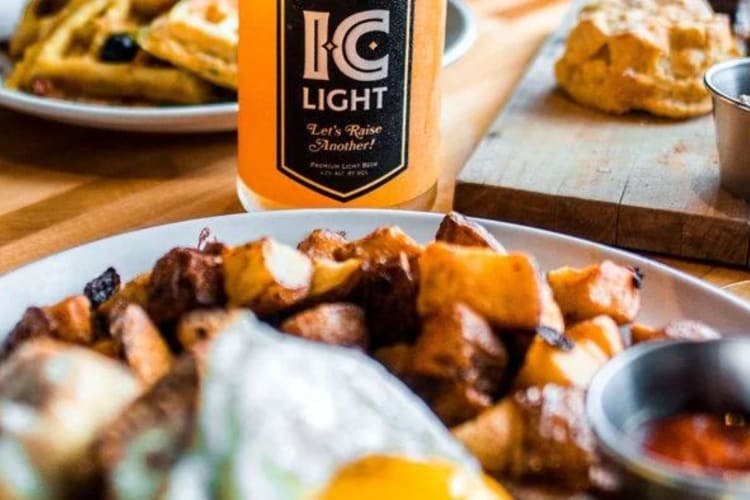 A plate of pub food and a beer at a Pittsburgh restaurant.