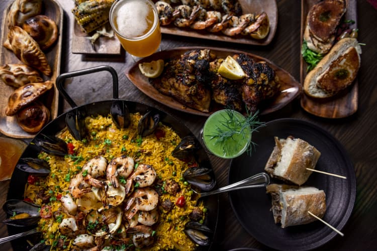 Topview of a range of Argentinian dishes on a table.