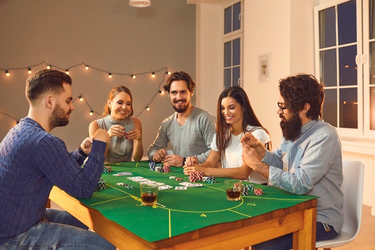 Five friends playing poker