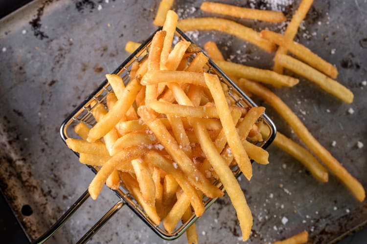 Aerial shot of French fries in a serving basket