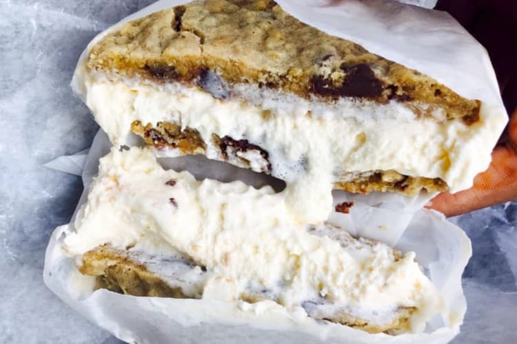 An ice cream sandwich with chocolate chip cookies