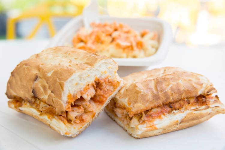 A spicy chicken sandwich on a table