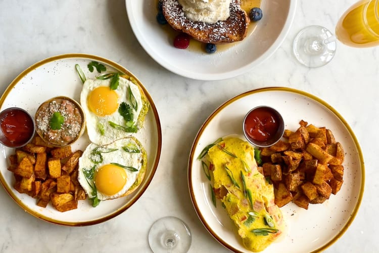 A selection of breakfast dishes on a table