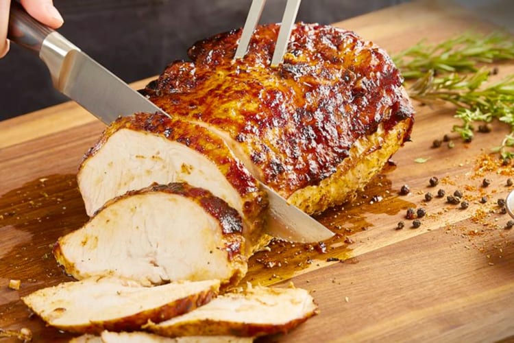 Pork roast being sliced
