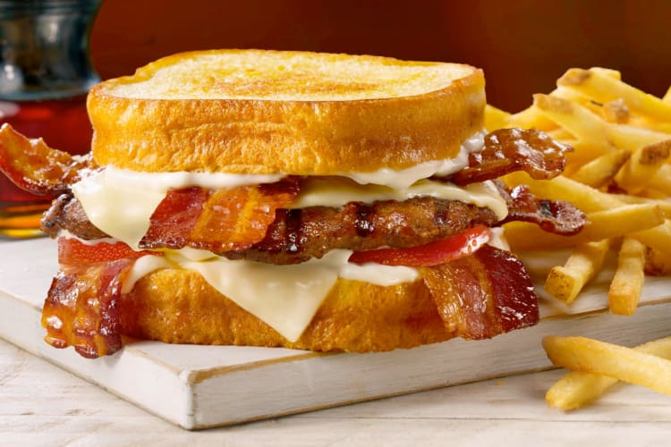 Fries and a bacon cheeseburger with Texas toast