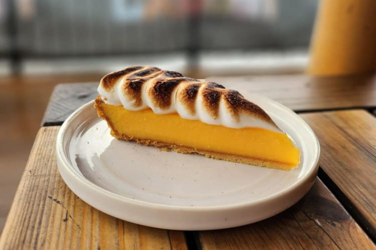 A slice of lemon meringue pie.