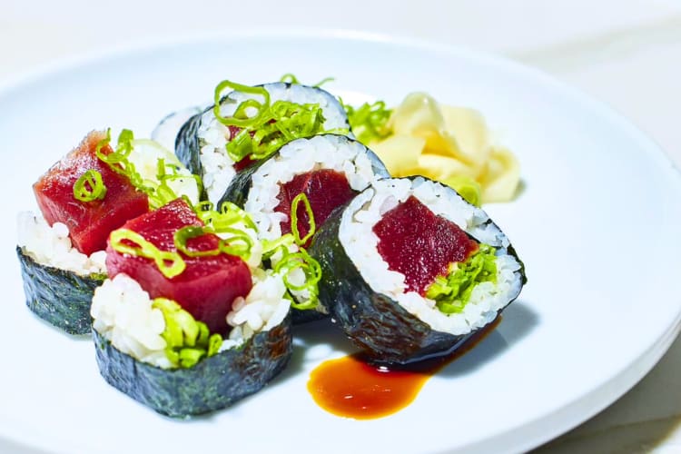 Fresh tuna sushi on a white plate