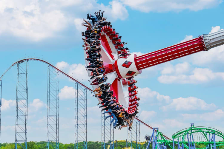 People riding a rollercoaster at Six Flags America — a great team building activity in D.C. 
