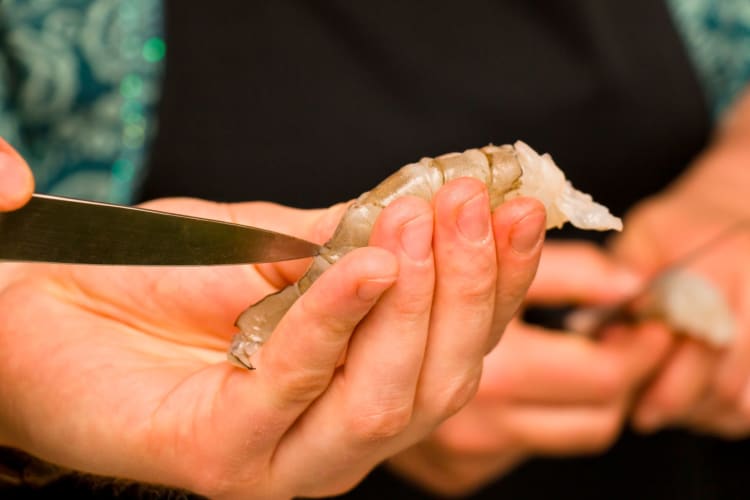 A utility knife can be used for deveining shrimp.