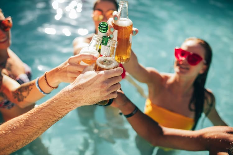 friends toasting for International Beer Day