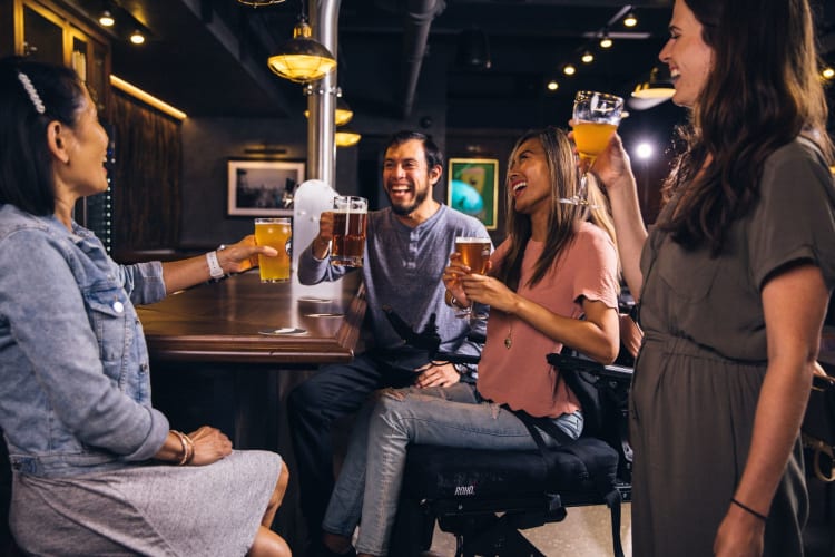 friends drinking a beer together