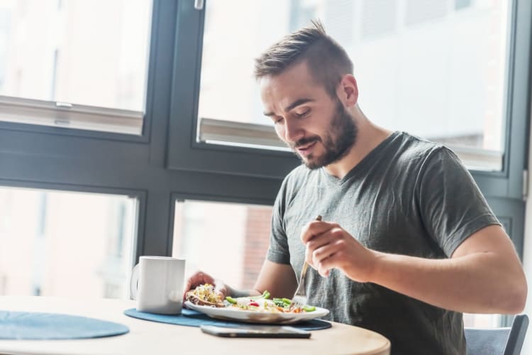 man eating healthy food