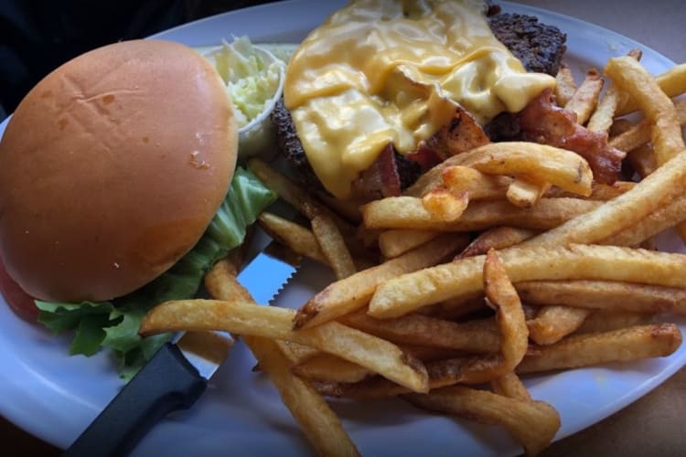 a cheeseburger and fries