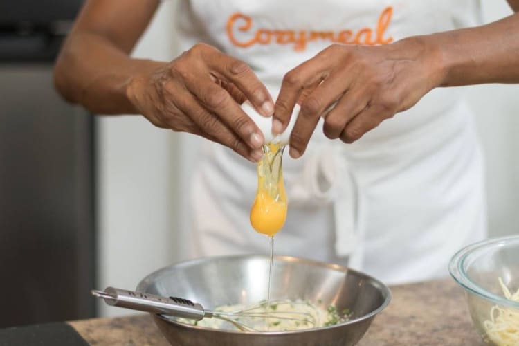 chef cracking an egg