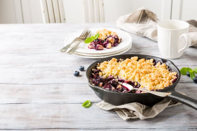 blueberry cobbler in a cast iron skillet