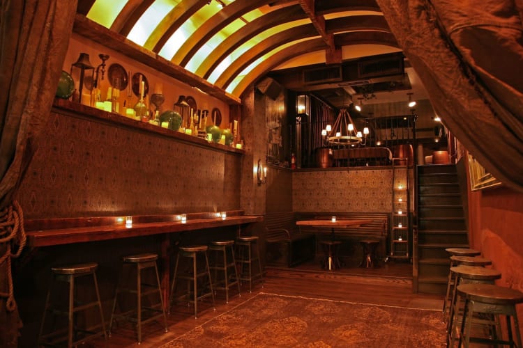 a ship-themed restaurant with wooden walls and overhead beams