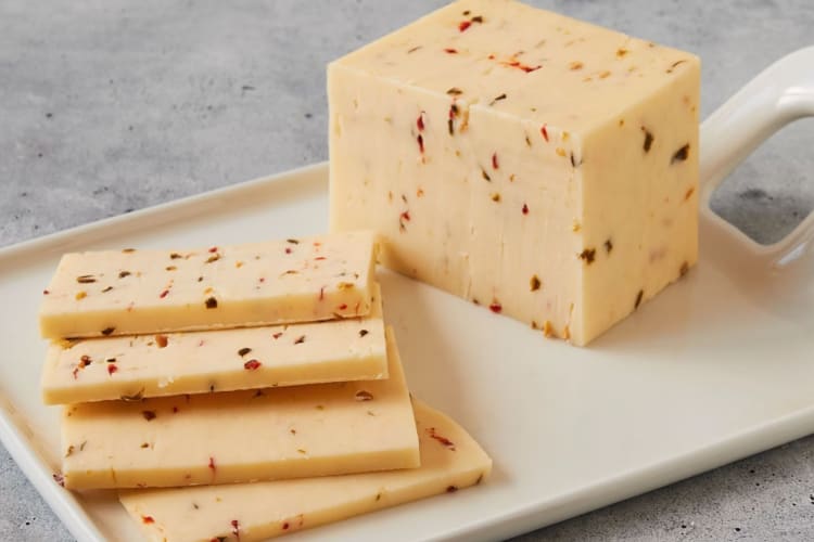 Maple Leaf Red Wax Gouda – a sweet, creamy Gouda cheese | Murray's Cheese