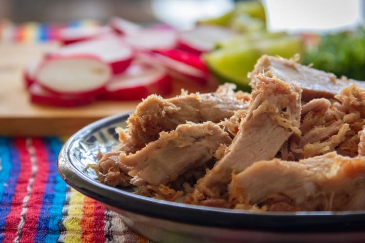 Carnitas are specially seasoned pulled pork pieces.