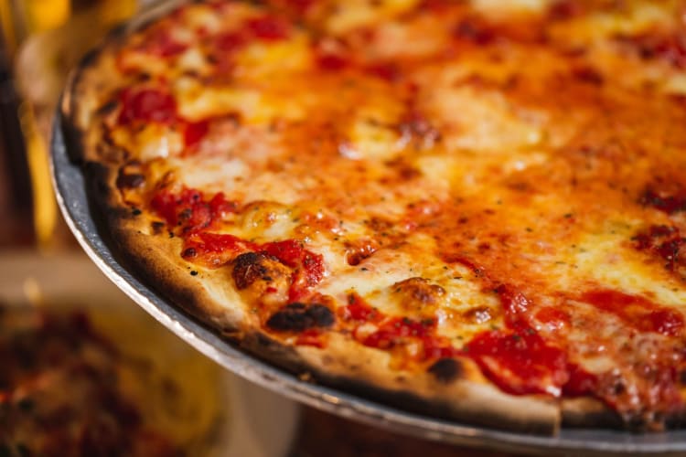 Order pizza off Goldbelly for National Cheese Pizza Day.