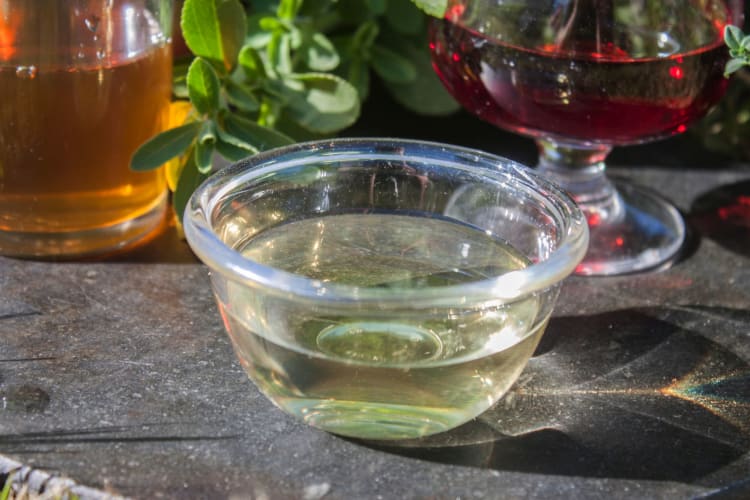 White vinegar — a great cream of tartar substitute — in a clear bowl
