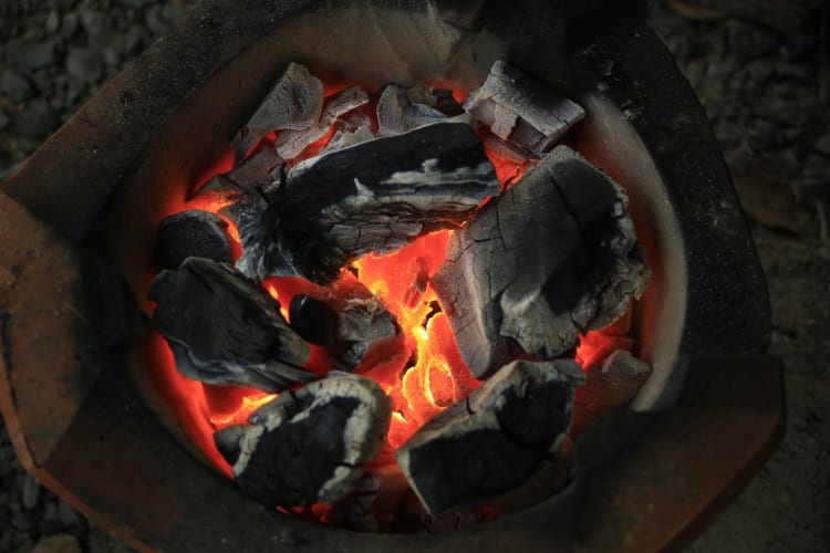 Charcoal briquettes make a good liquid smoke substitute.