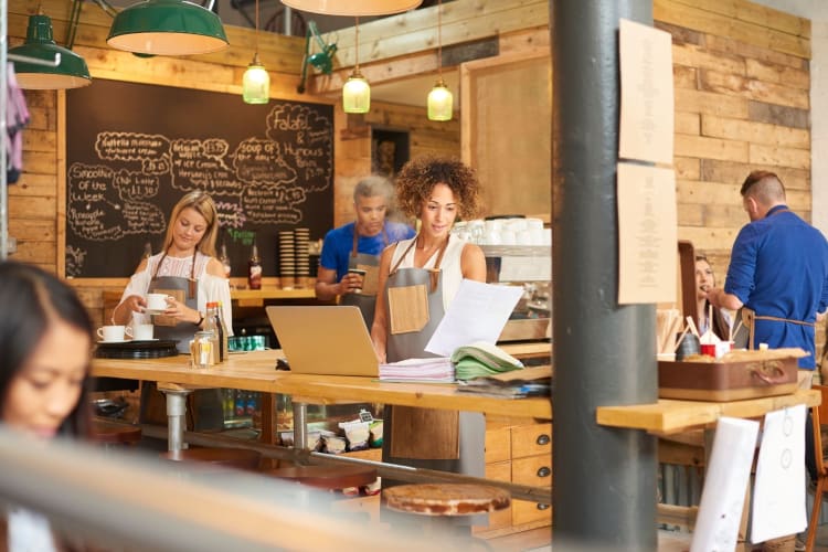 a busy, well-lit coffee shop