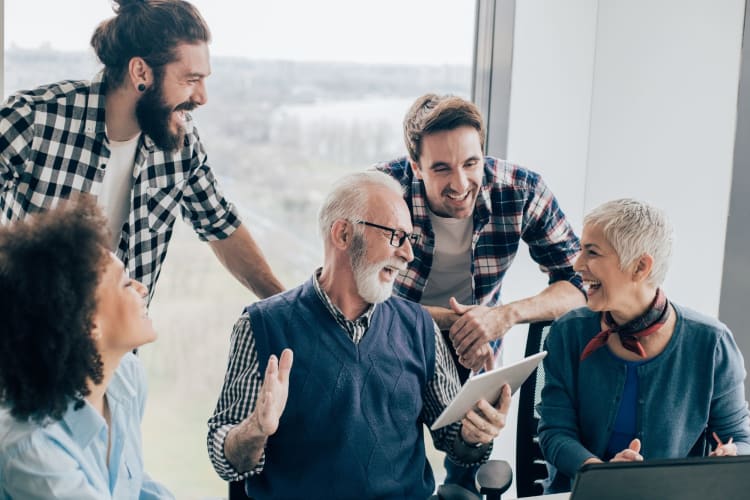 happy, smiling employees of diverse ages