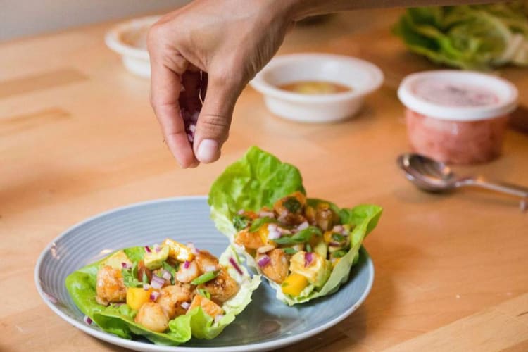 chef preparing lettuce wraps