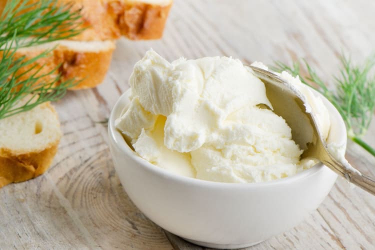 fresh cream cheese in a bowl