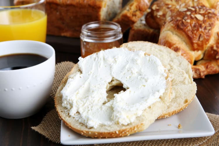 cream cheese spread on a bagel