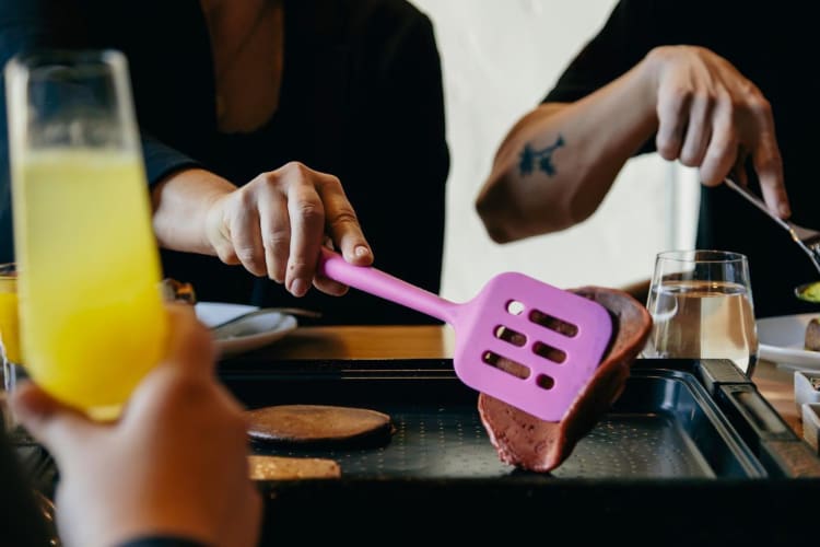 people making their own pancakes at Flap Your Jacks