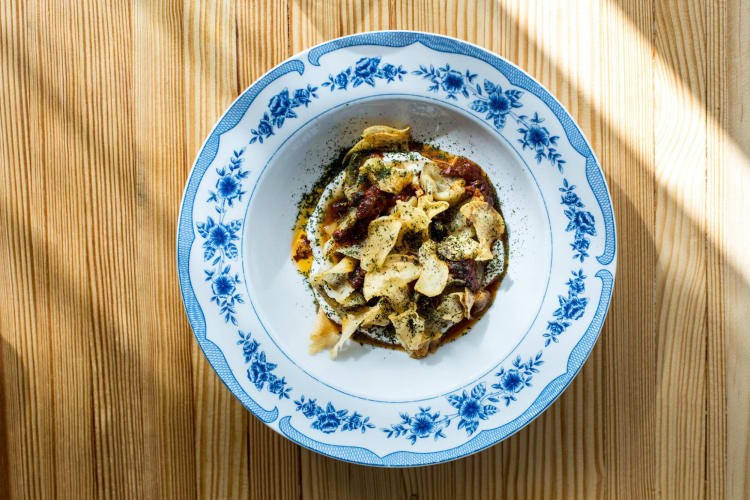 Aerial view of a meal from Nancy's Hustle, a modern bistro-style restaurant in Houston.