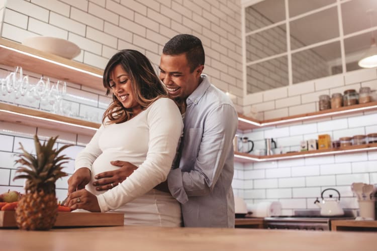 a couple cooking together