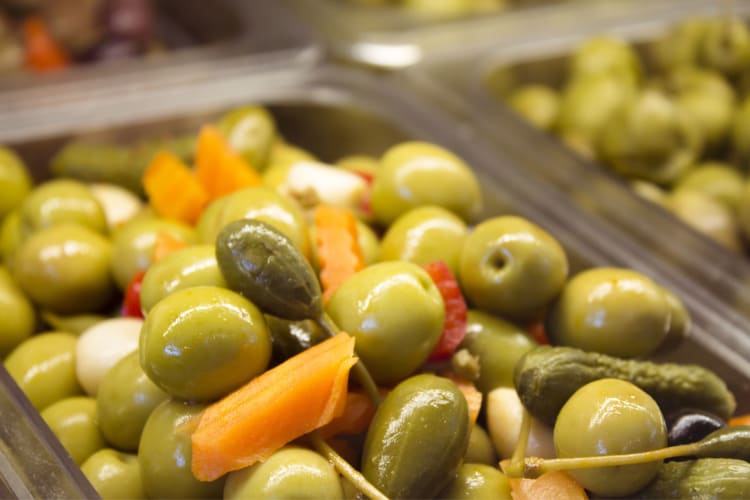 unpitted olives in a bowl