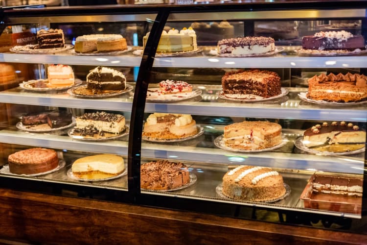 a full case of colorful, decadent pastries