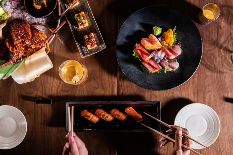 a luxurious table full of sushi and sashimi