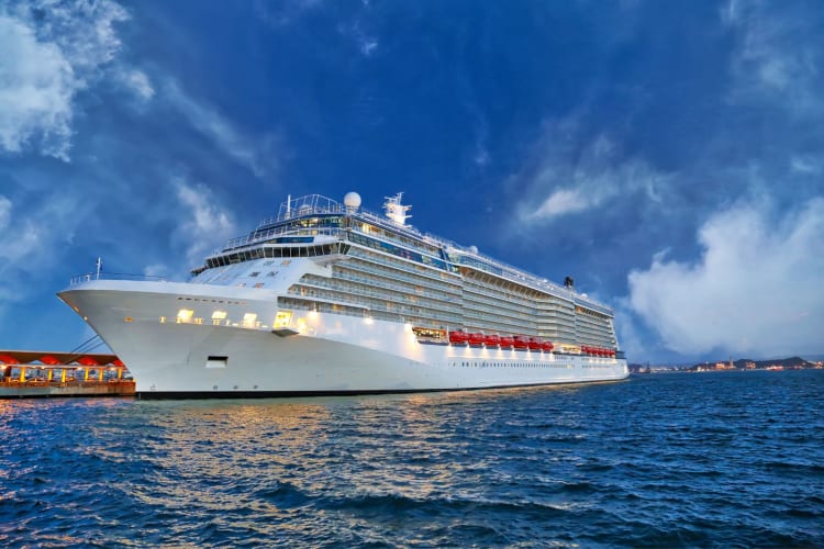 a cruise ship at sunset