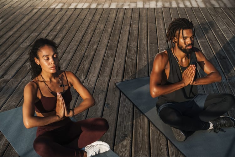 Couple doing yoga