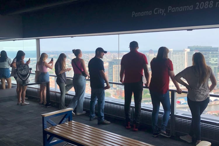 tourists looking off the top of the World Trade Center in Baltimore.