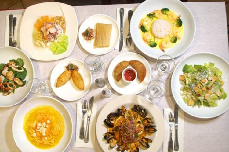 a spread of Peruvian dishes on a table